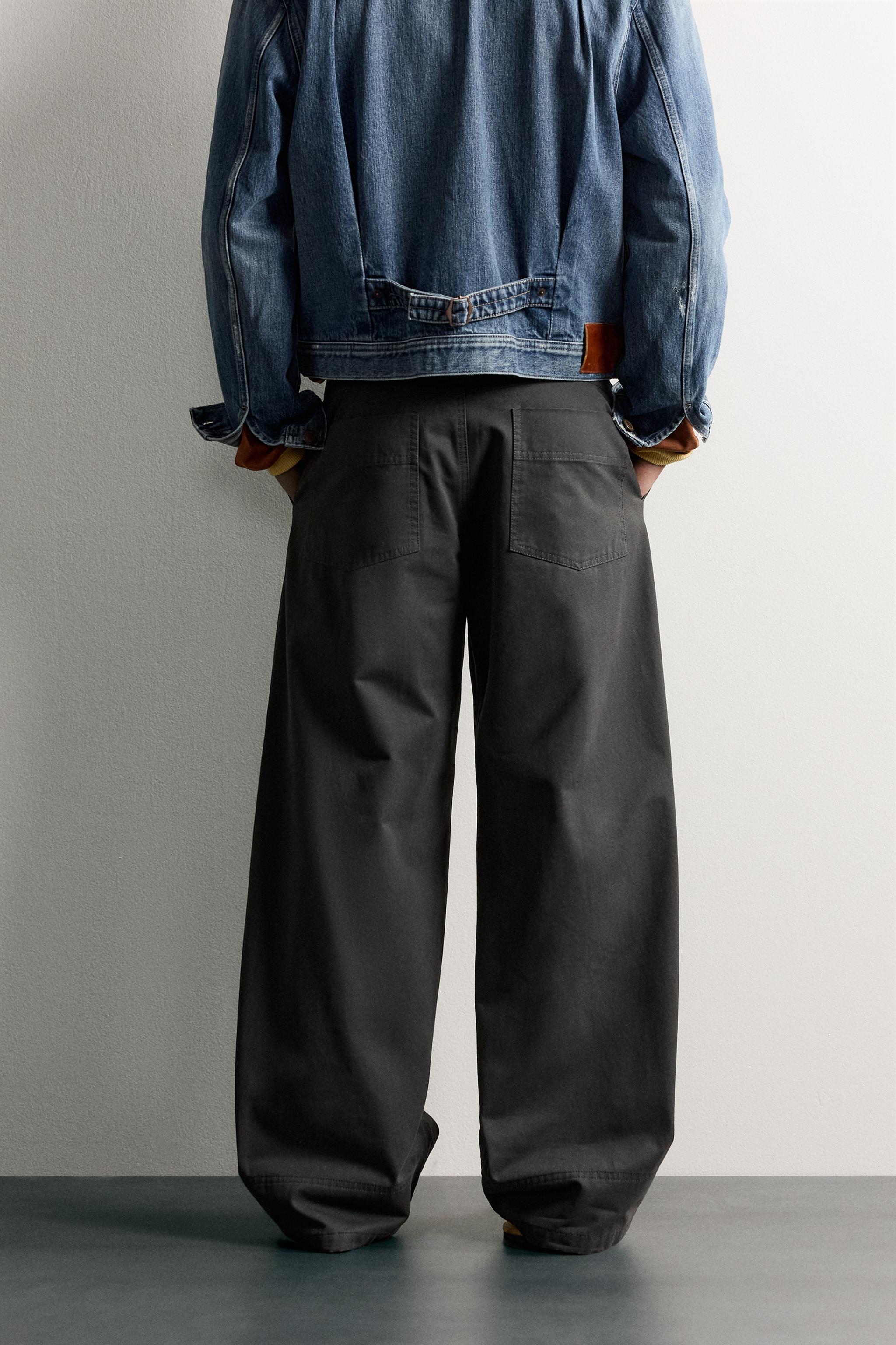 PLEATED WIDE FIT PANTS